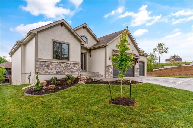 view of front of property featuring a garage and a front lawn