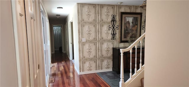 hallway with dark wood-type flooring