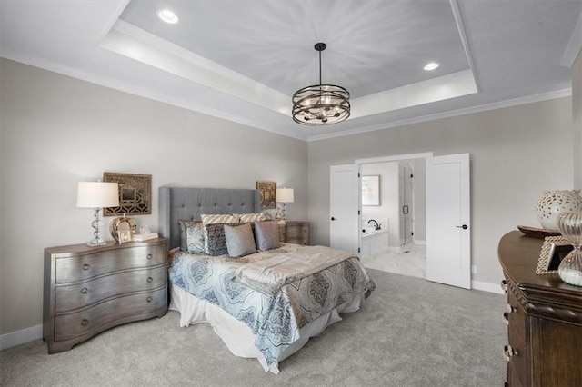 bedroom featuring crown molding, light carpet, an inviting chandelier, and a tray ceiling