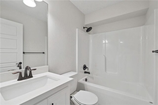 full bathroom with toilet, shower / bathtub combination, and vanity