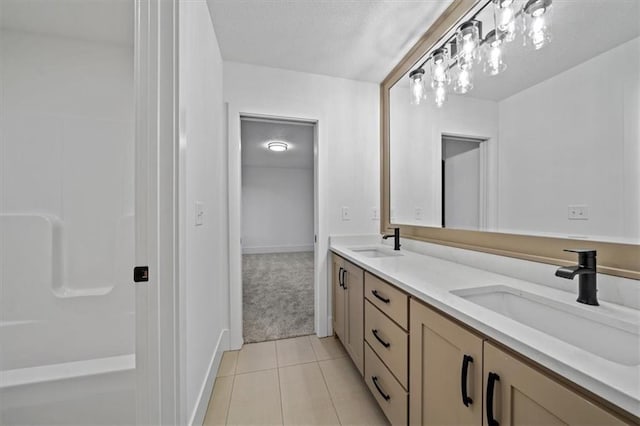 bathroom featuring tile patterned floors and vanity