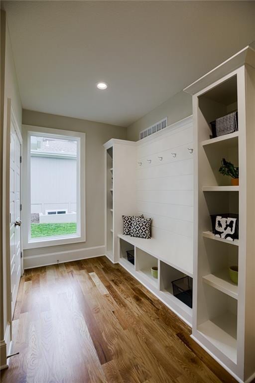 mudroom with hardwood / wood-style flooring