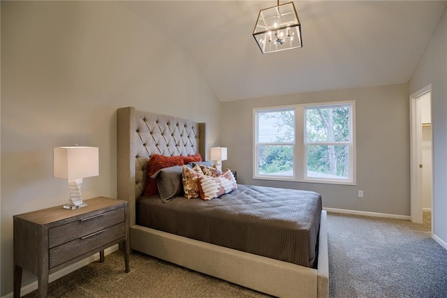 carpeted bedroom featuring lofted ceiling and a notable chandelier