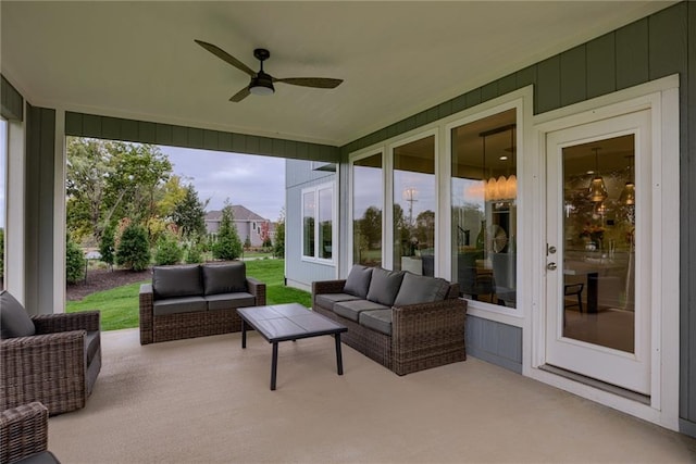 sunroom / solarium with ceiling fan