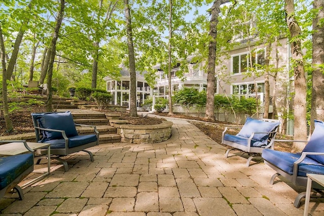 view of home's community featuring a patio area