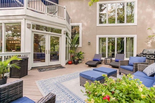 exterior space featuring hardwood / wood-style flooring and french doors