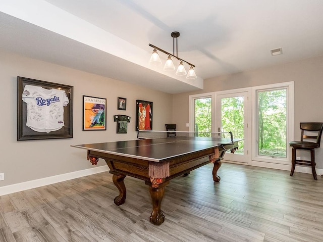 rec room featuring light hardwood / wood-style floors