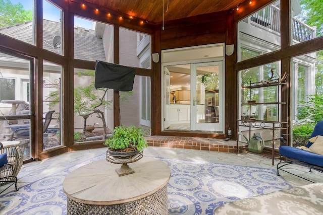 sunroom with wooden ceiling