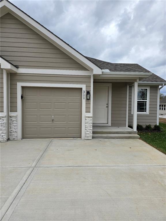 single story home with a garage