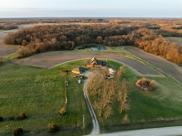 aerial view with a rural view and a water view