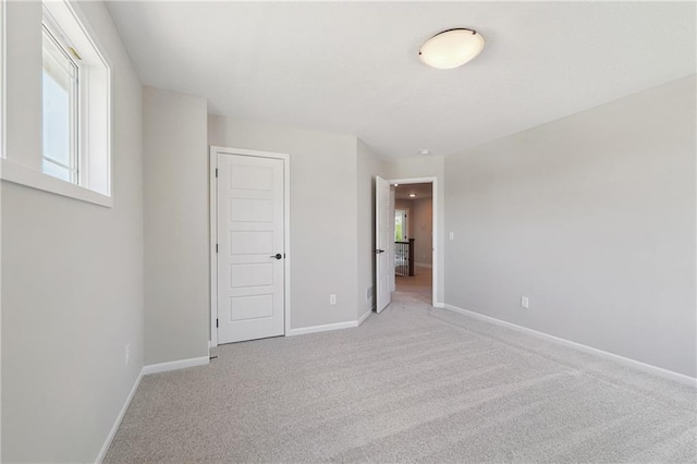 unfurnished bedroom featuring carpet