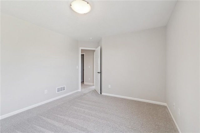 unfurnished room with carpet