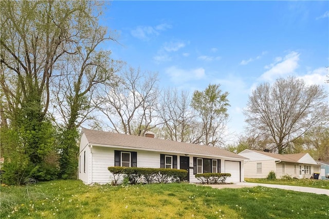 ranch-style house with a front lawn and a garage