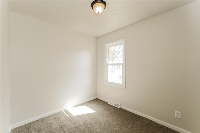 empty room with carpet floors