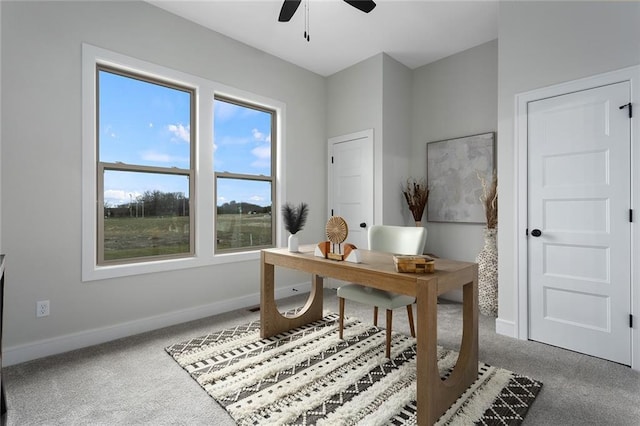 office space with carpet flooring and ceiling fan