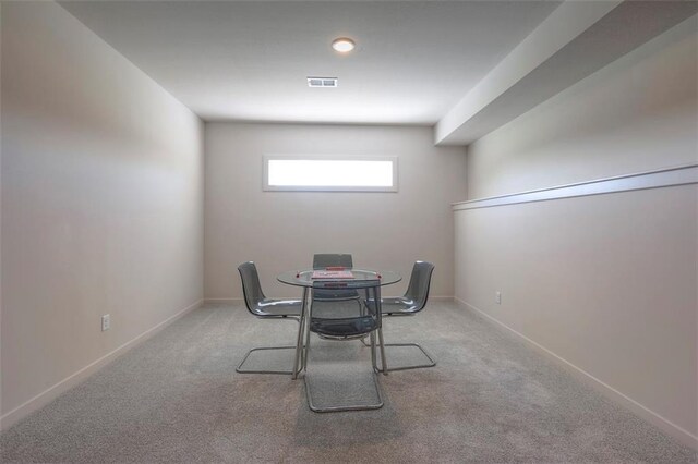 view of carpeted dining room