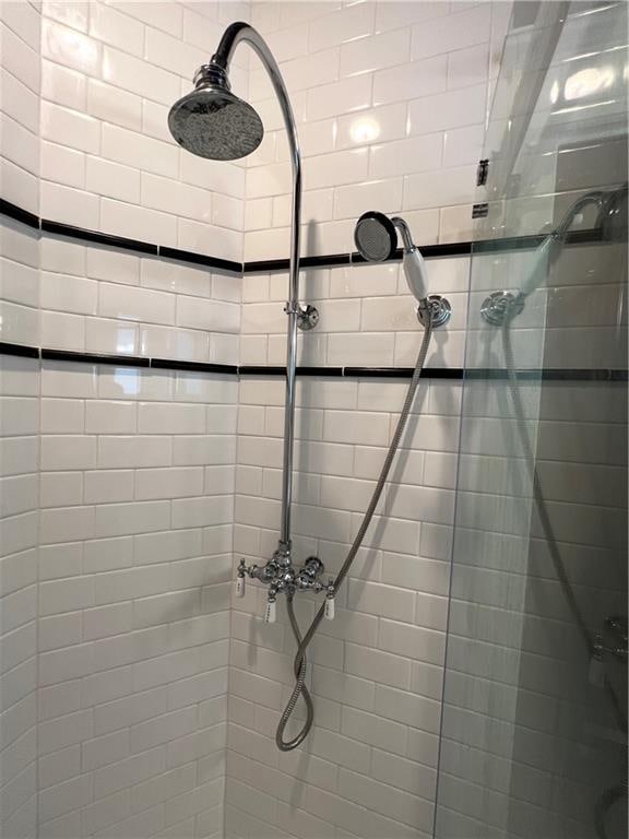 interior space featuring a tile shower