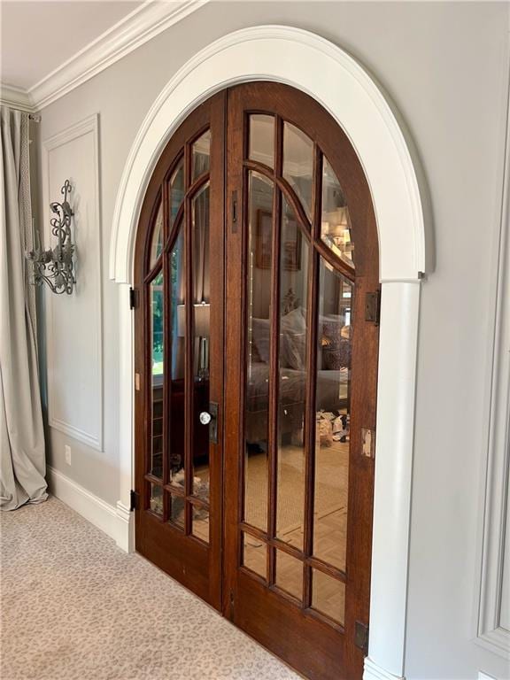 interior space with french doors and carpet floors