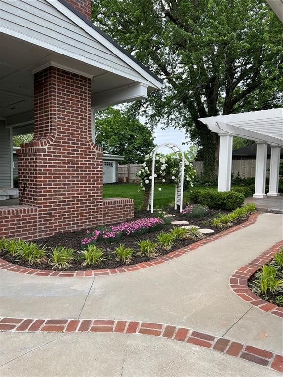 view of property exterior featuring a pergola