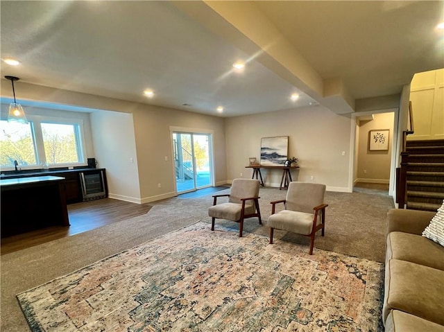 carpeted living room with wine cooler