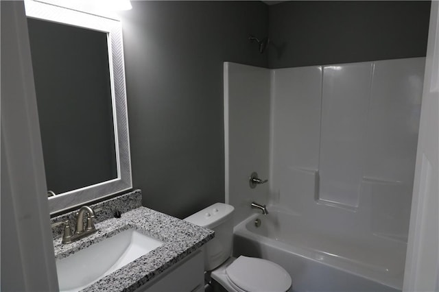 full bathroom featuring vanity, toilet, and tub / shower combination