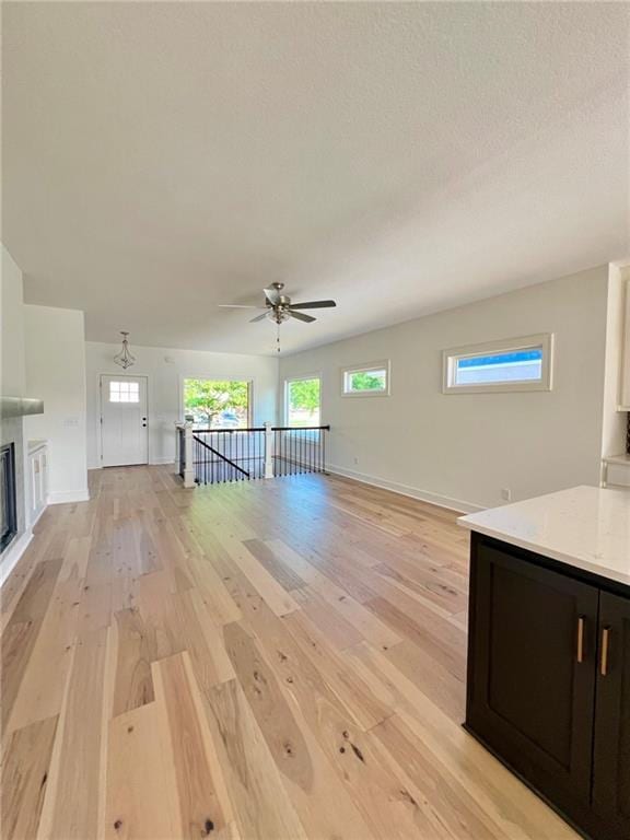 unfurnished living room featuring light hardwood / wood-style floors