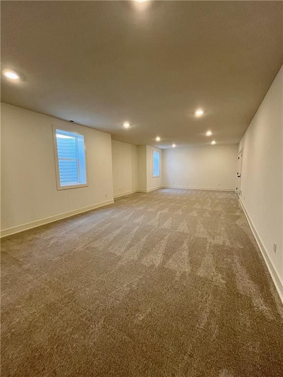 basement featuring carpet flooring