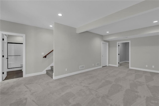 basement with light carpet