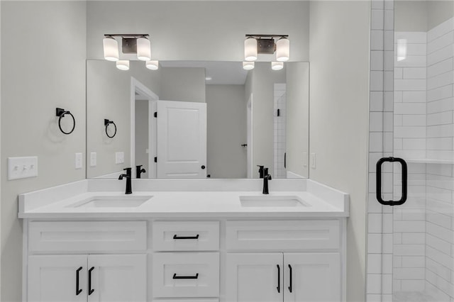 bathroom with vanity and an enclosed shower