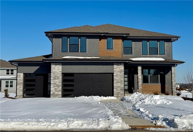 prairie-style home with a garage