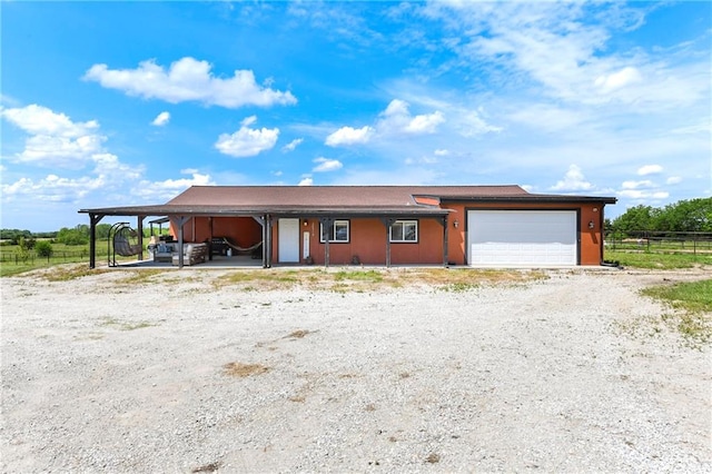 view of front of home with a garage