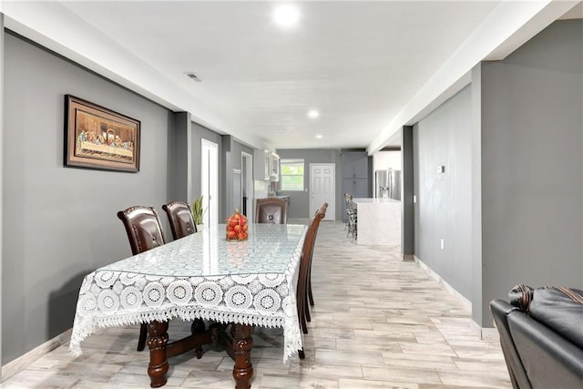 dining room featuring light wood-type flooring