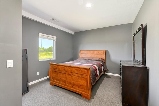 bedroom featuring carpet