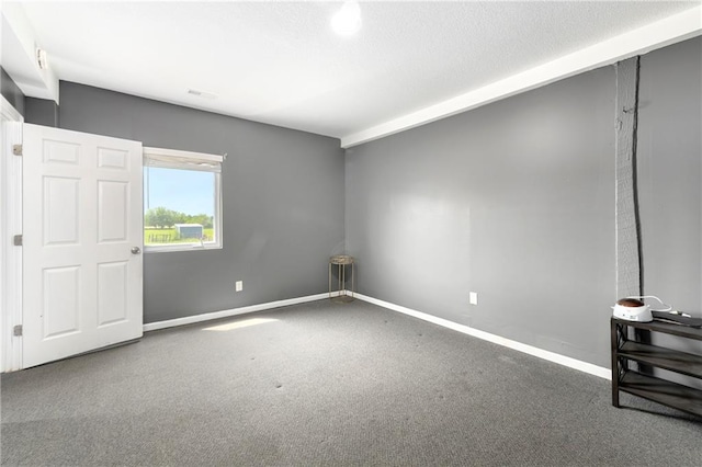 unfurnished room featuring carpet floors