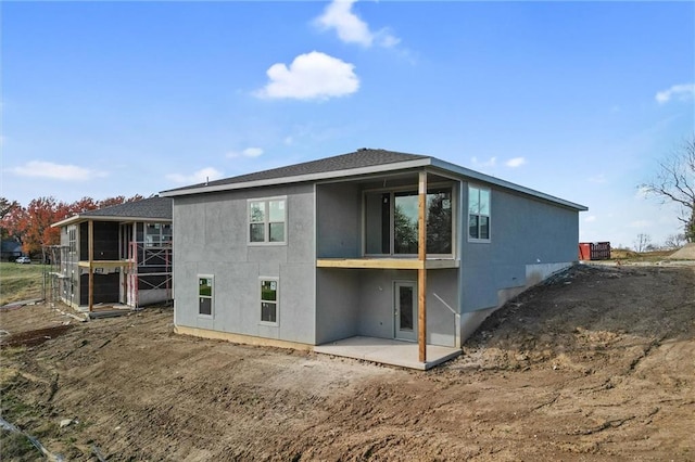 rear view of house with a patio area