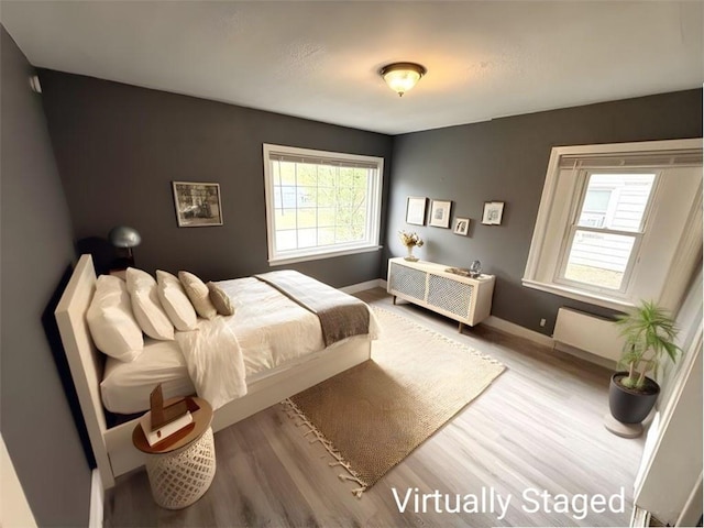 bedroom featuring light hardwood / wood-style flooring