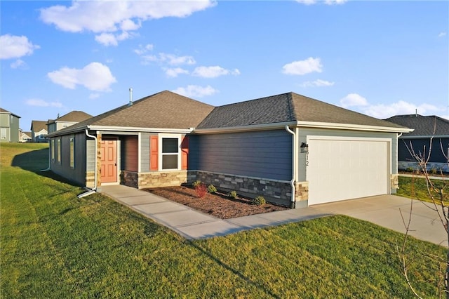 ranch-style house featuring a garage and a front yard