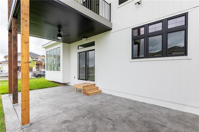 view of patio / terrace featuring a balcony and ceiling fan