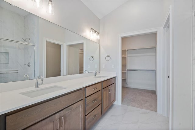 bathroom featuring vanity and walk in shower