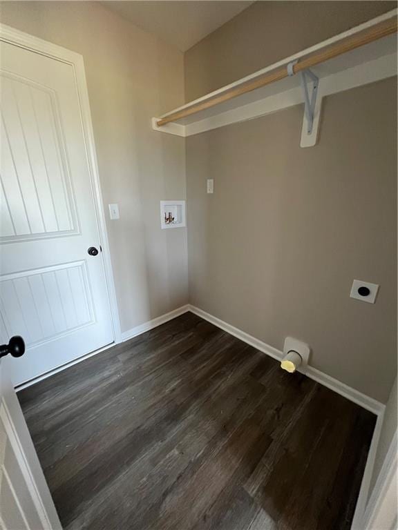 laundry area featuring dark hardwood / wood-style floors, electric dryer hookup, and washer hookup