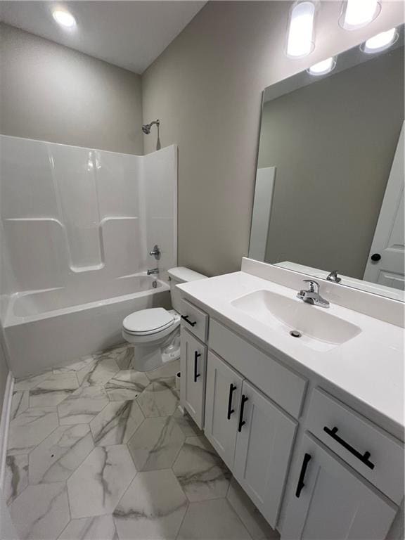 full bathroom featuring tile patterned flooring, toilet, tub / shower combination, and vanity