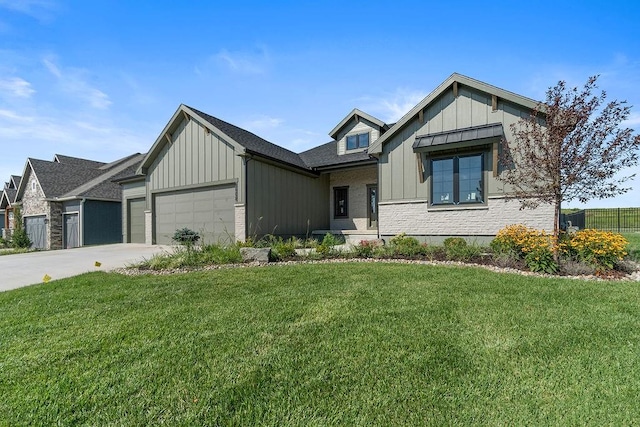 modern farmhouse style home with a garage and a front yard