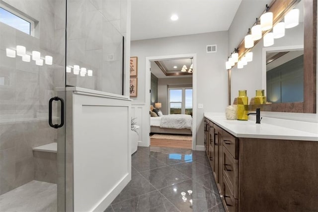 bathroom with walk in shower, crown molding, and vanity