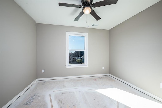 spare room with ceiling fan