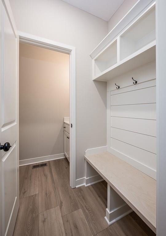 mudroom featuring dark hardwood / wood-style flooring