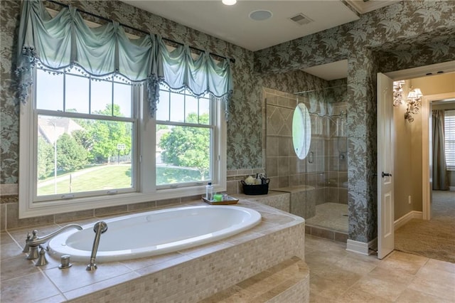 full bathroom featuring wallpapered walls, visible vents, tile patterned flooring, a tile shower, and a bath