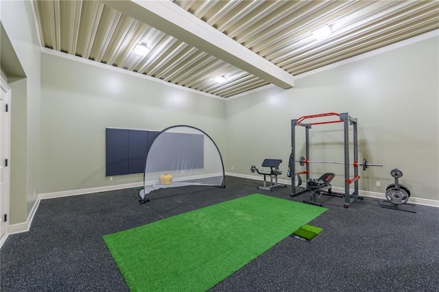 workout room with baseboards