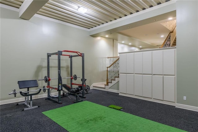 workout room with recessed lighting and baseboards