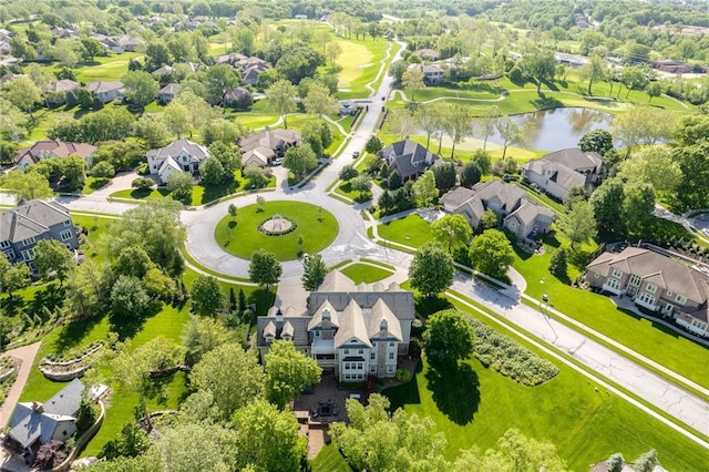 aerial view featuring a water view and a residential view