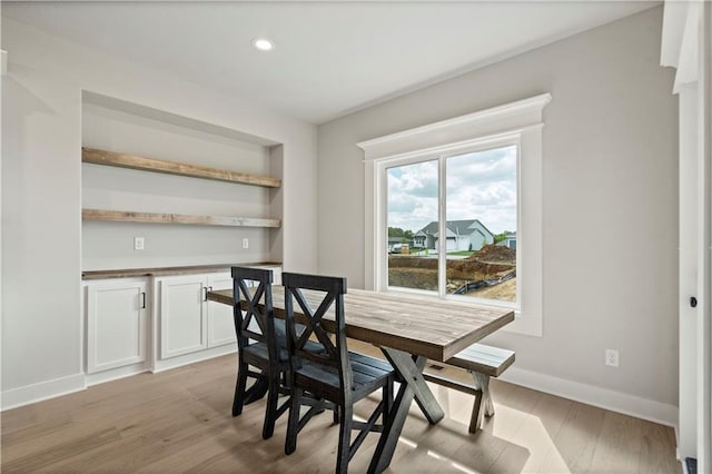 dining space featuring light hardwood / wood-style floors